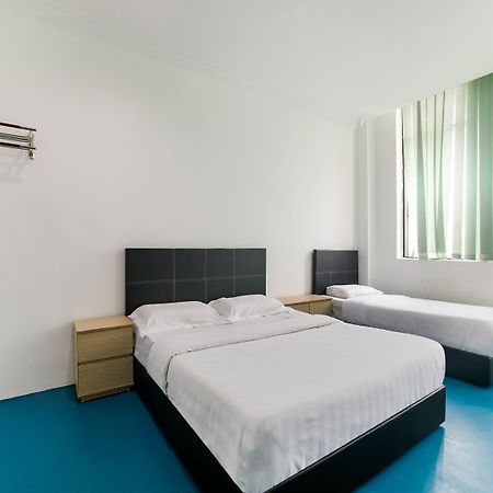 Spot On 89726 Capsule Inn Кота-Кінабалу Екстер'єр фото